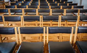 Aisle Prints: Empty chairs in the church awaiting wedding guests