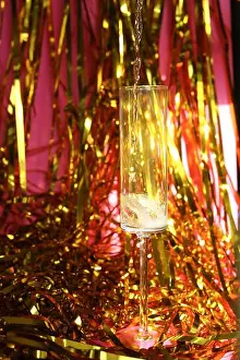 Countdown Prints: Champagne being Poured into Modern Glass flute for a toast