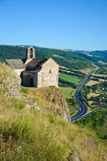 Motorway Prints: Chapel Sainte-Madeleine overlooking the A75 motorway and view on Massiac village