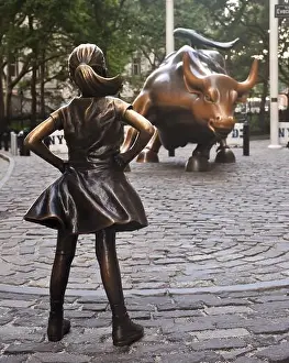 New York Prints: The Charging Bull and Fearless Girl statues in downtown Manhattan on Wall Street in New York City