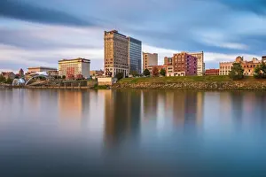 Charleston, West Virginia, USA downtown skyline on the Kanawha River at dusk