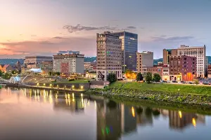 Charleston, West Virginia, USA skyline on the Kanawha River at dusk
