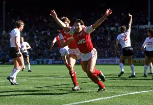 Celebrating Prints: Charlie Nicholas of Arsenal scores one of his two goals during the 2-1 win over Liverpool in the Littlewoods League Cup