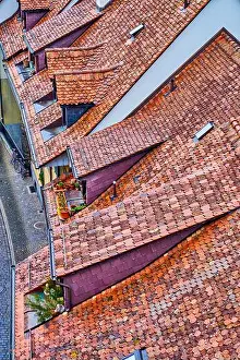 Bern Prints: Charming and traditional red tiled roofs of medieval houses in old town of Bern