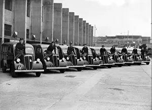 Hood Prints: Chauffeurs, nine women on nine cars, 1940s, Great Britain