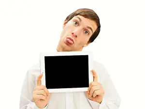Gaze Prints: Cheeky man sticking out his tongue holding an iPad