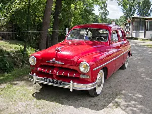 Ford Prints: A cherry red Simca Vedette pictured in France