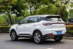 Stock Photograph Prints: Chery Tiggo 7 Pro (badged at Tiggo 7 Plus for China) SUV car pictured being driven during a test in Shanghai