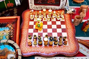 Folkloric Prints: Chess pieces made in traditional Kyrgyz style dressed in folk costumes