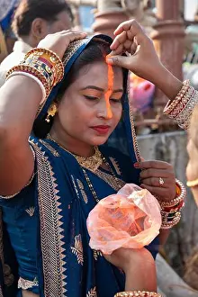 Saree Prints: Chhath Puja Hindu festival with orange sindoor line on nose to signify devotion to Sun God Surya