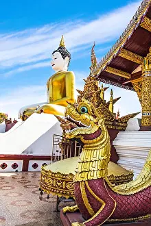 Guardian Prints: Chiang Mai, Thailand. Enormous Buddha statue at Wat Rajamontean with Naga (serpents) guarding the entrance