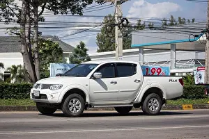 Chiangmai, Thailand - November 15 2018: Private car, Mitsubishi Triton Pickup Truck. On road no.1001, 8 km from Chiangmai Business Area