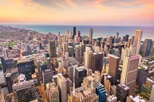 Chicago, Illinois, USA aerial cityscape towards Lake Michigan at dusk