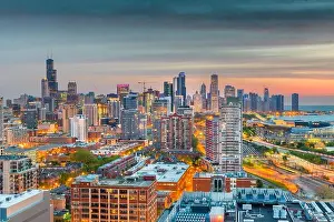 Chicago, Illinois, USA aerial downtown skyline at dusk towards Lake Michigan