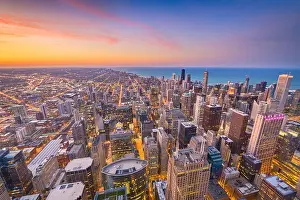 Chicago, Illinois, USA aerial downtown skyline at dusk towards Lake Michigan