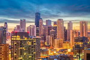 Chicago, Illinois, USA aerial downtown skyline at dusk towards Lake Michigan