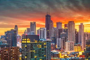 Chicago, Illinois, USA aerial downtown skyline at dusk towards Lake Michigan