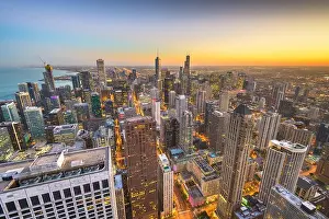 Chicago, Illinois USA aerial skyline towards Lake Michigan just after sunset
