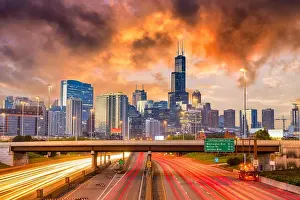 Chicago, Illinois, USA downtown skyline over highways at twilight