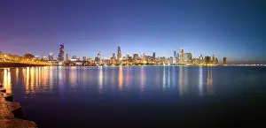 Chicago, Illinois, USA downtown skyline from Lake Michigan at dusk