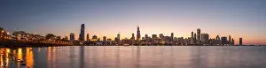 Chicago, Illinois, USA downtown skyline from Lake Michigan at dusk