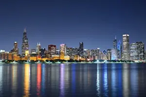 Chicago, Illinois, USA downtown skyline from Lake Michigan at dusk
