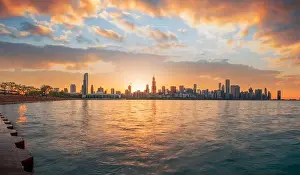 Chicago, Illinois, USA downtown skyline from Lake Michigan at dusk
