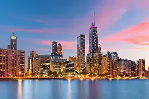 Chicago, Illinois, USA downtown skyline from Lake Michigan at dusk
