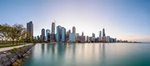 Chicago, Illinois, USA downtown skyline from Lake Michigan at dusk