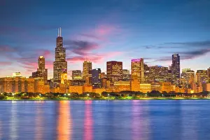 Chicago, Illinois, USA downtown skyline from Lake Michigan at dusk