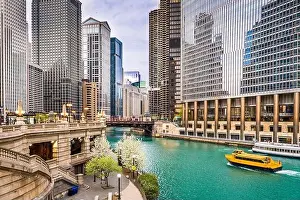 Chicago, Illinois, USA sightseeing cruise and skyline on the river