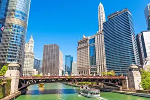 Chicago, Illinois, USA sightseeing cruise and skyline on the river