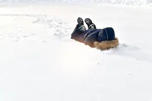 Slips Prints: The child is playing in the snow