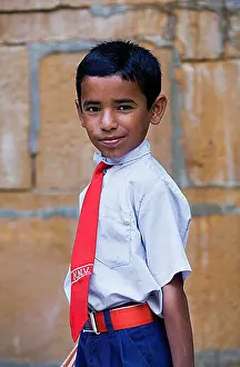 Rajasthani Prints: Child in school uniform, Jaisalmer, Rajasthan, India