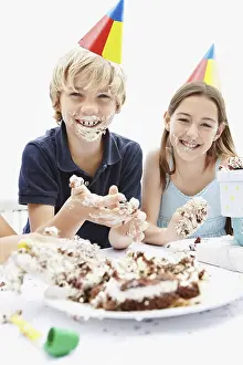 Amusing Prints: Children eating birthday cake with their hands