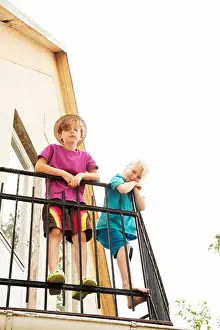 Lean Prints: Children looking down from balcony