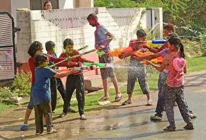 Holi Prints: Children play with colors as they celebrate Holi