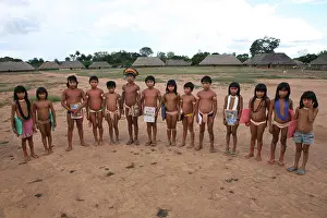 Infants Prints: Children of the Xingu Indian go to school built in the village by the ministry of education