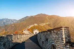China The great wall distant view compressed towers and wall segments autumn season in mountains near Beijing ancient chinese fortification military l