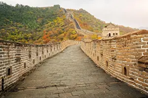 China The great wall distant view compressed towers and wall segments autumn season in mountains near Beijing ancient chinese fortification military l