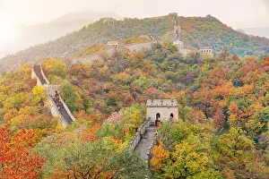 China The great wall distant view compressed towers and wall segments autumn season in mountains near Beijing ancient chinese fortification military l