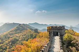 China The great wall distant view compressed towers and wall segments autumn season in mountains near Beijing ancient chinese fortification military l