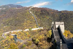 China The great wall distant view compressed towers and wall segments autumn season in mountains near Beijing ancient chinese fortification military l