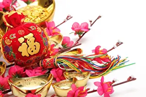 Auspicious Prints: Chinese New Year Decorations, Closeup on money bag with gold ingots and plum blossom