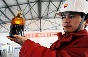 Crude Prints: A Chinese worker from CNPC (China National Petroleum Corporation)