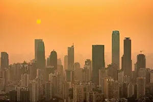 Chongqing, China downtown city skyline over the Yangtze River just before sunset