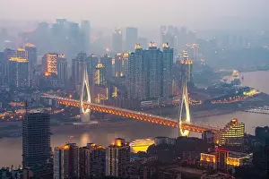 Chongqing, China downtown city skyline over the Yangtze River at sunset