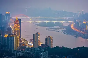 Chongqing, China downtown city skyline over the Yangtze River at sunset