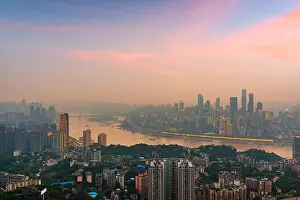 Chongqing, China downtown city skyline over the Yangtze River at sunset