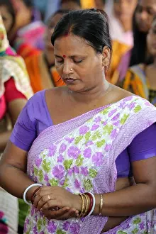 Christian believers during roman catholic Sunday mass in a small Church in Calcutta, India